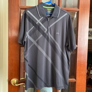 Greg Norman “Shark” golf shirt. Good used condition.